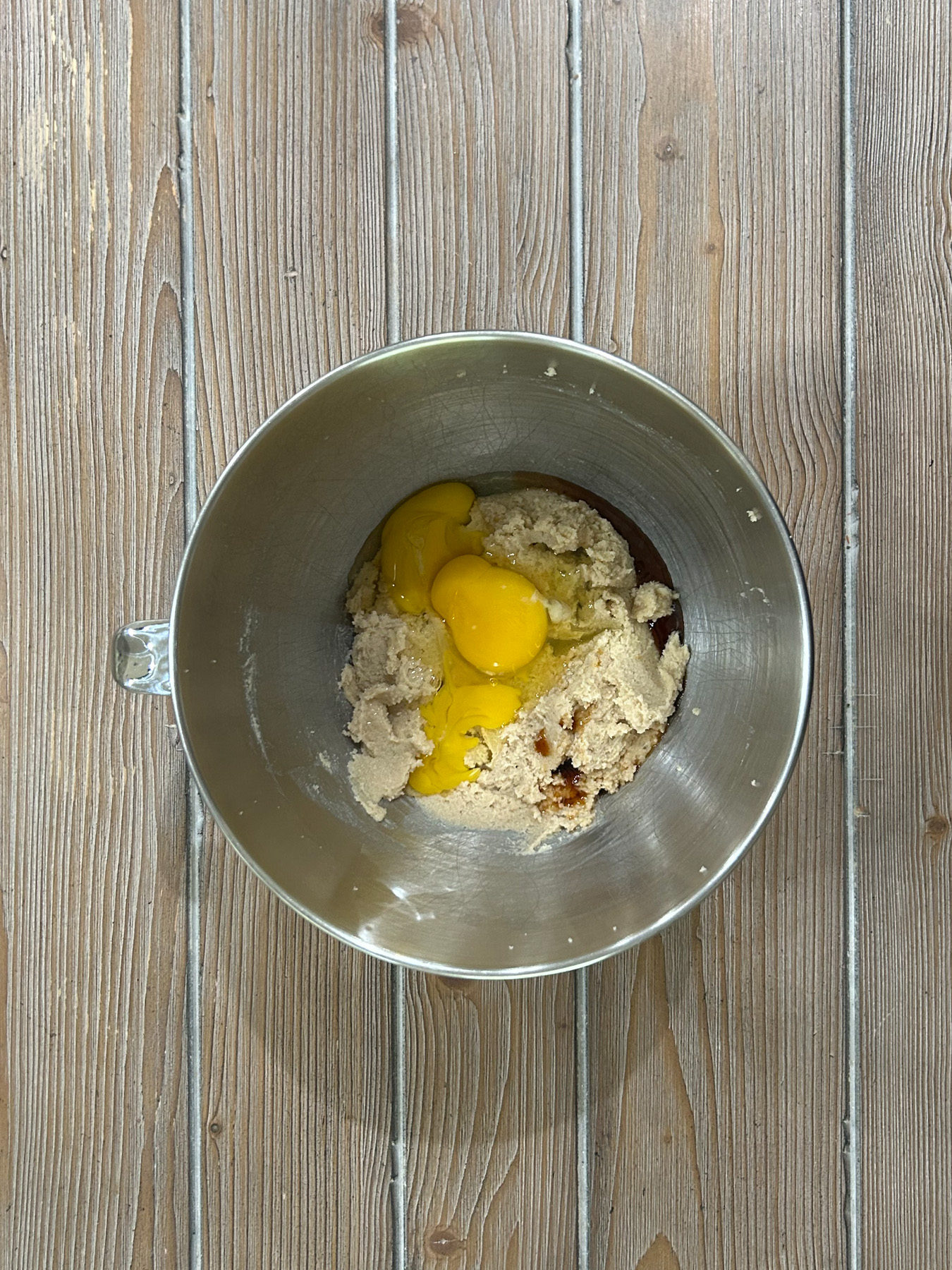 Egg and vanilla added to the mixing bowl.