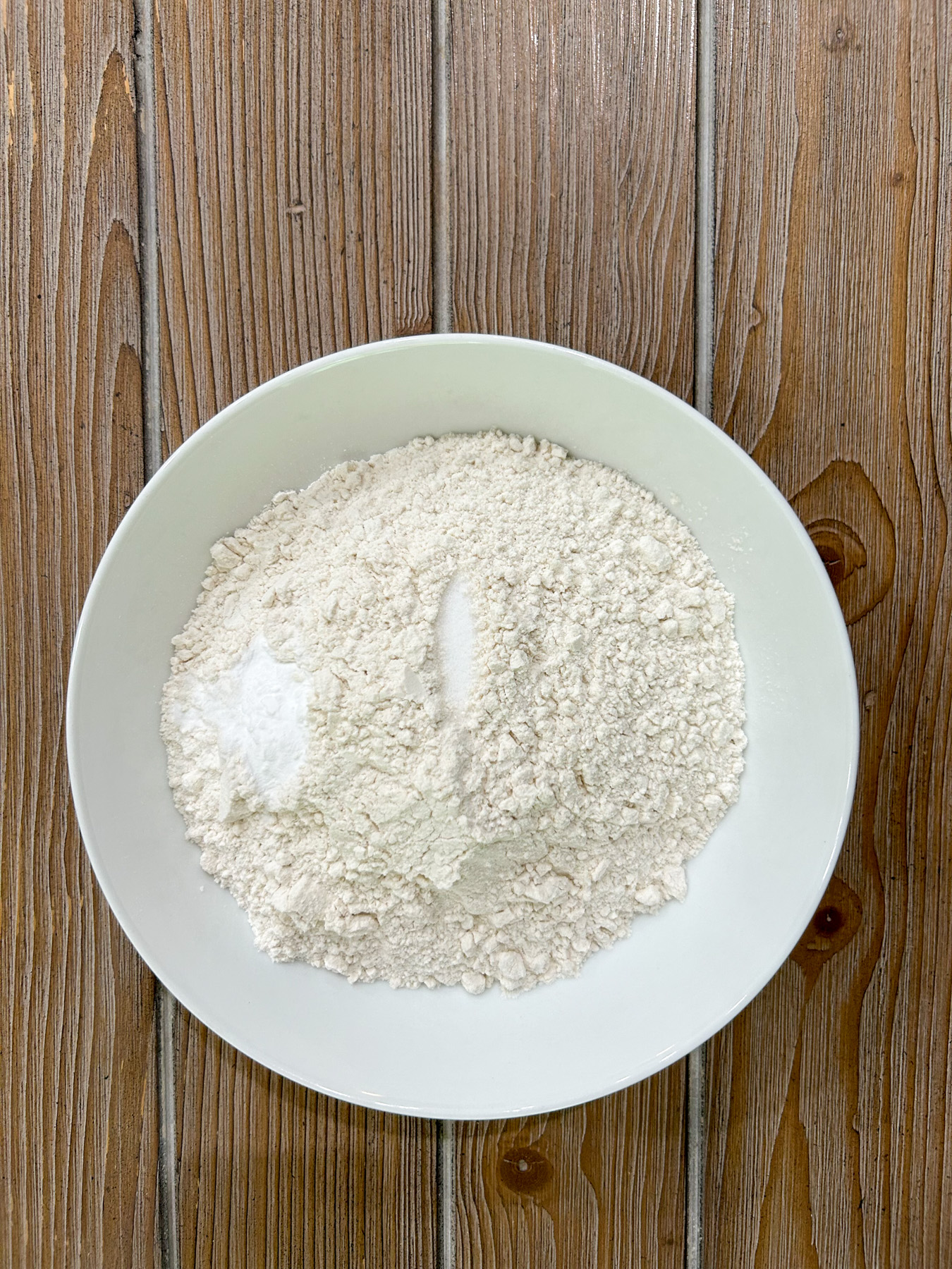 Dry ingredients in a white bowl.