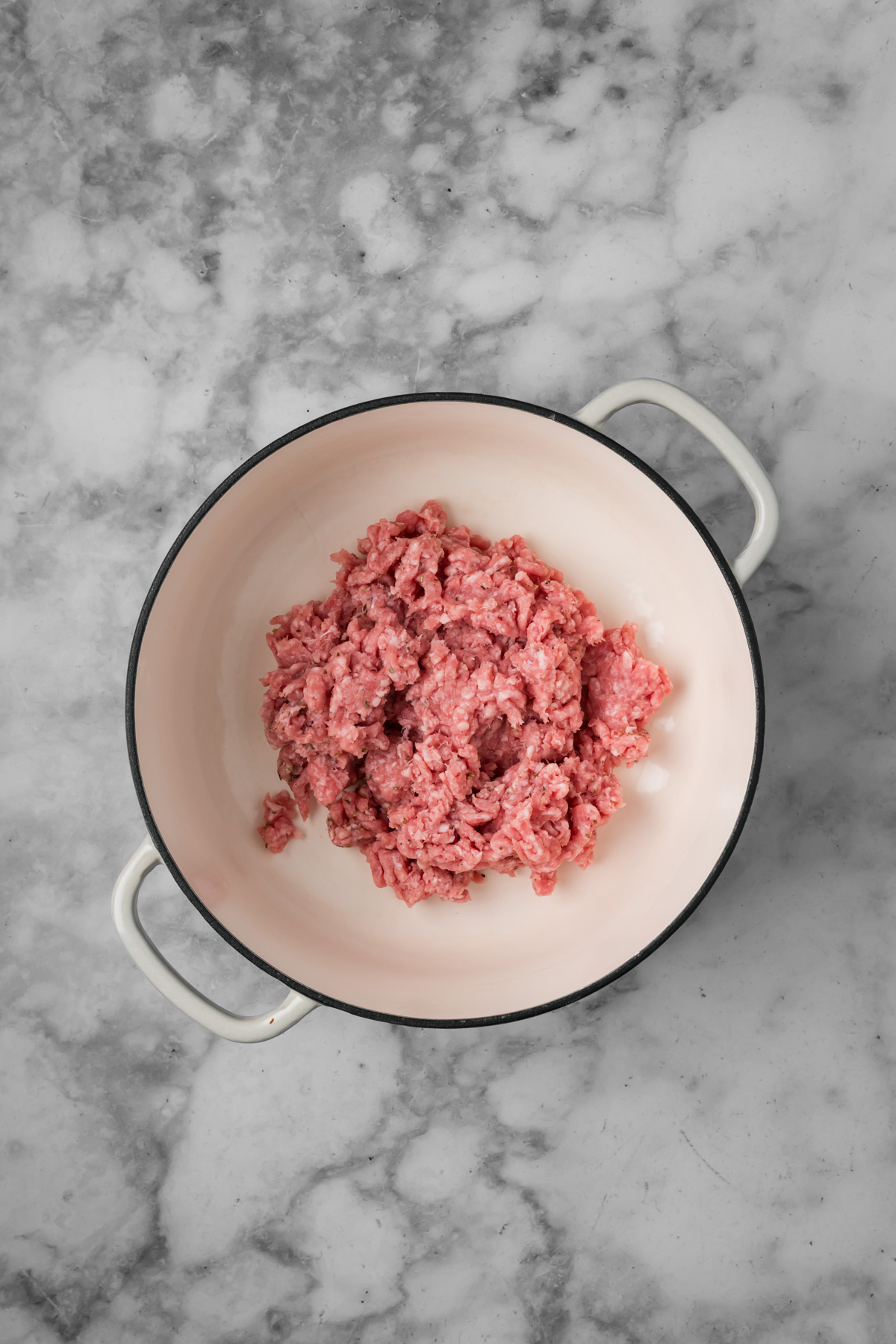 Italian sausage in a Dutch oven.