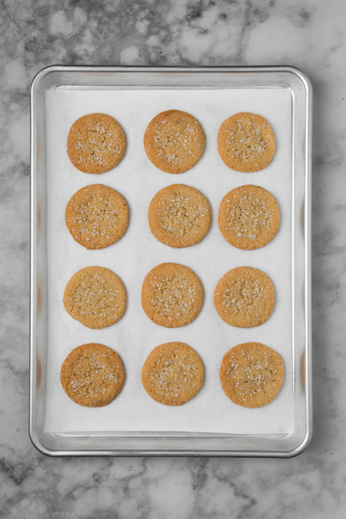 Cookies on a baking sheet after baking.