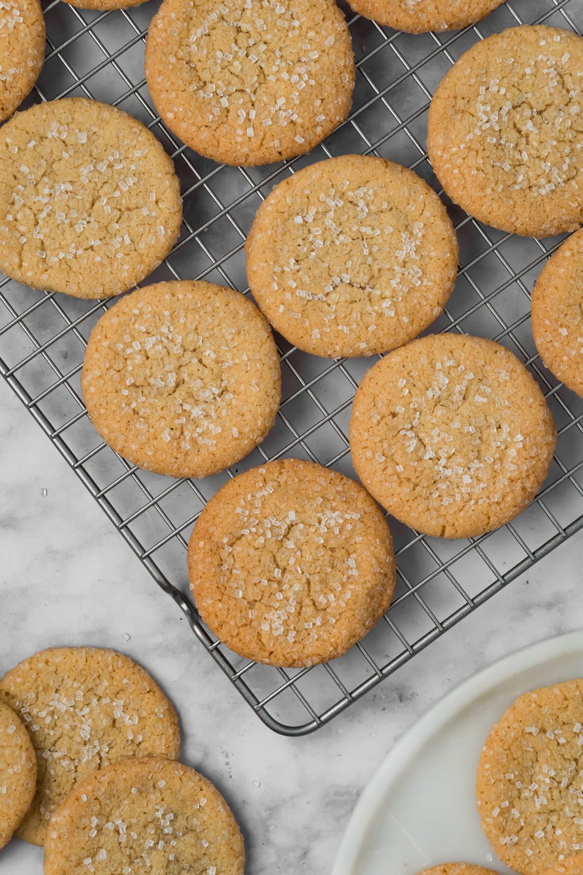 Brown butter sugar cookies on a wire rack.