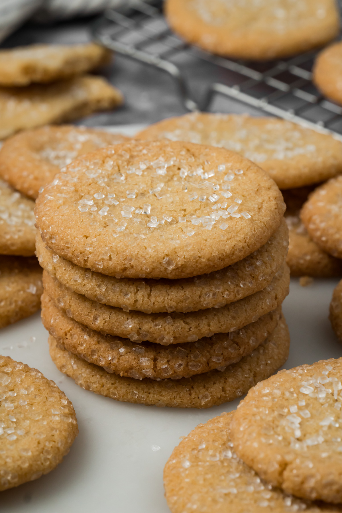 Brown butter sugar cookies stacked on top of each other.