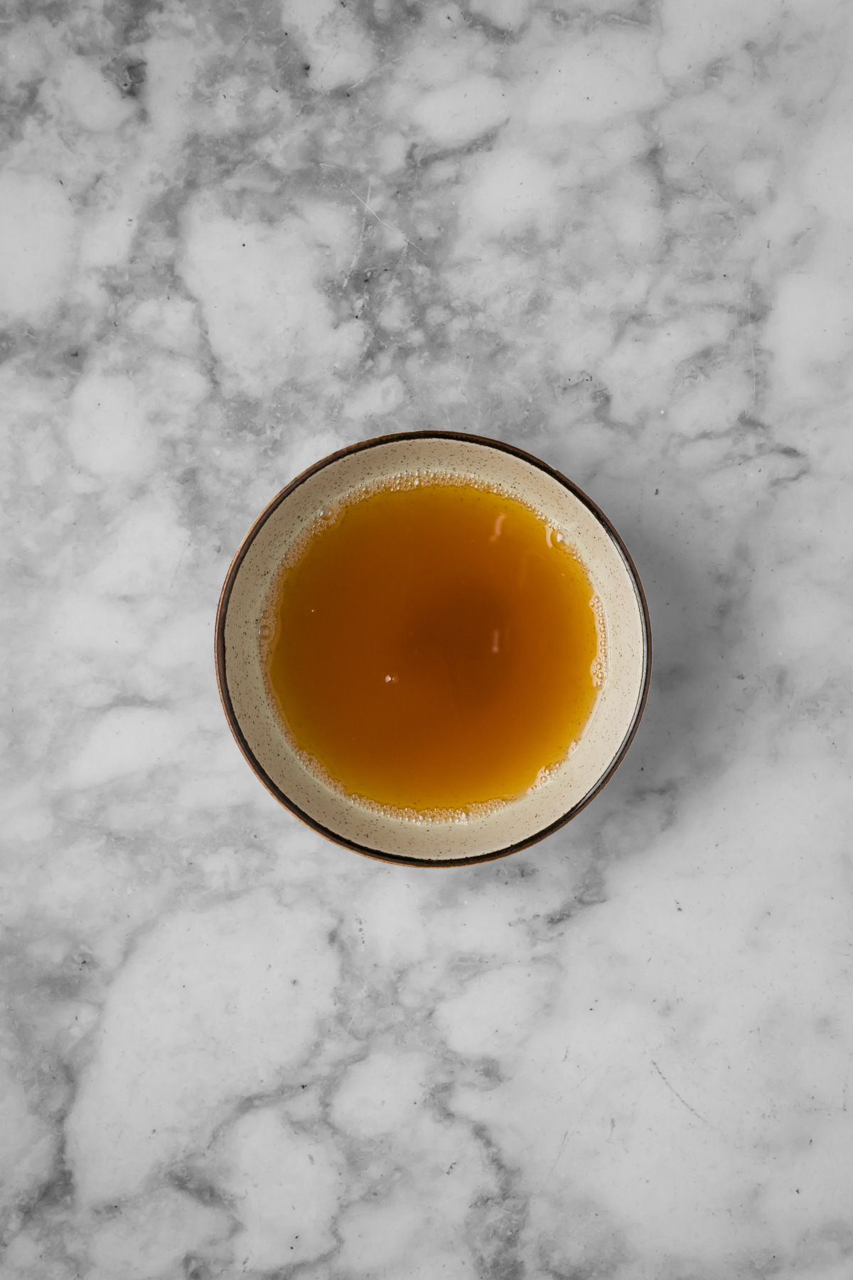 Browned butter in a bowl.