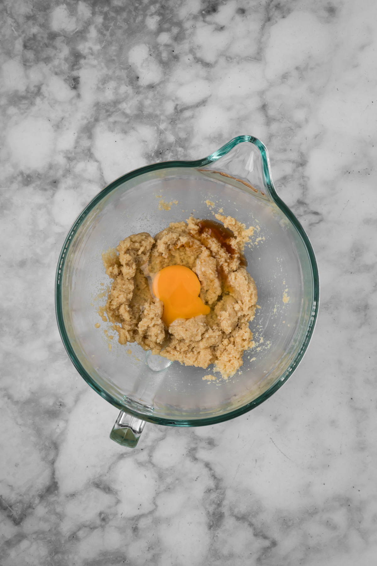 Egg and vanilla added to the mixing bowl.