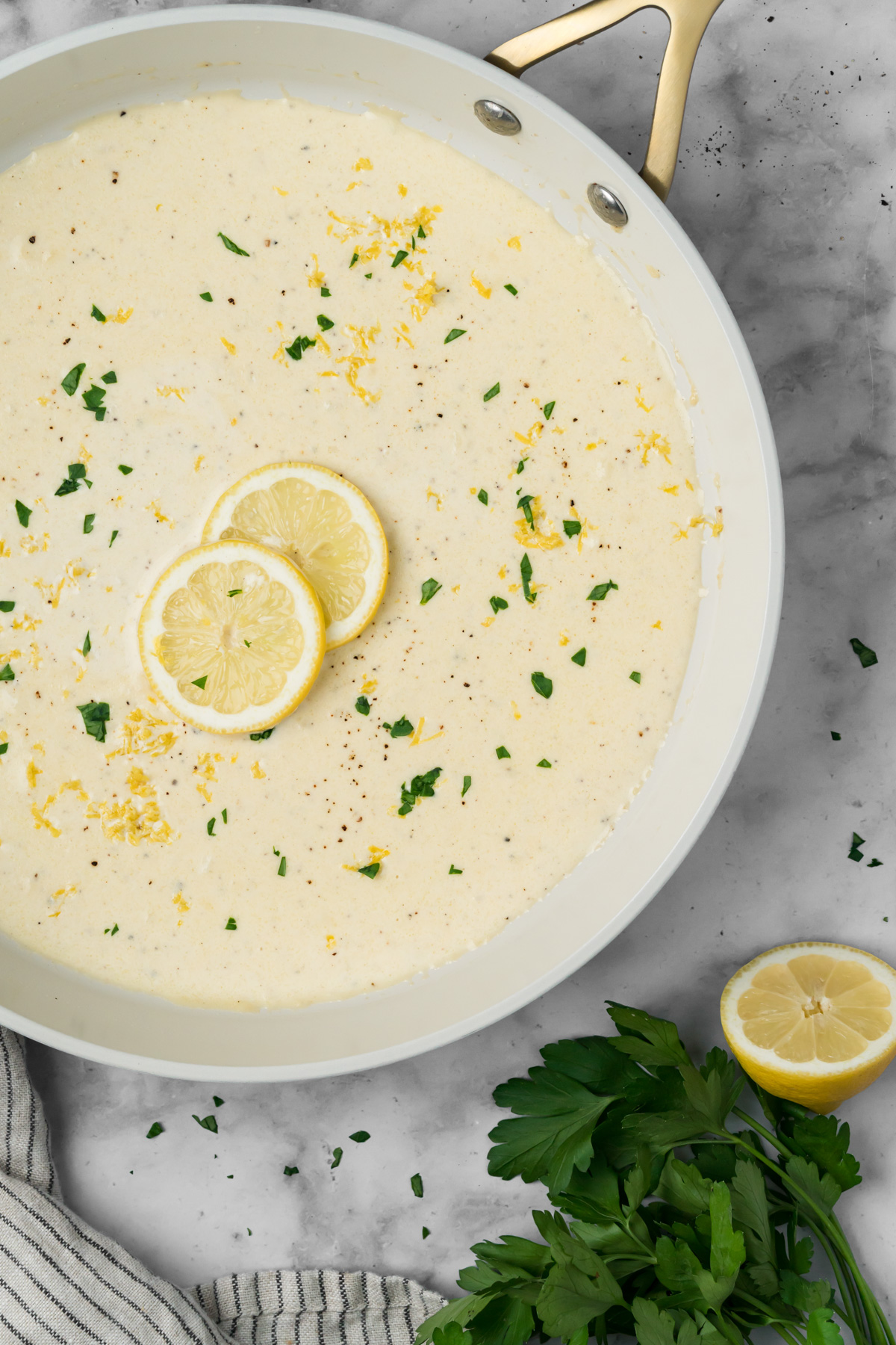 Lemon cream sauce in a skillet.