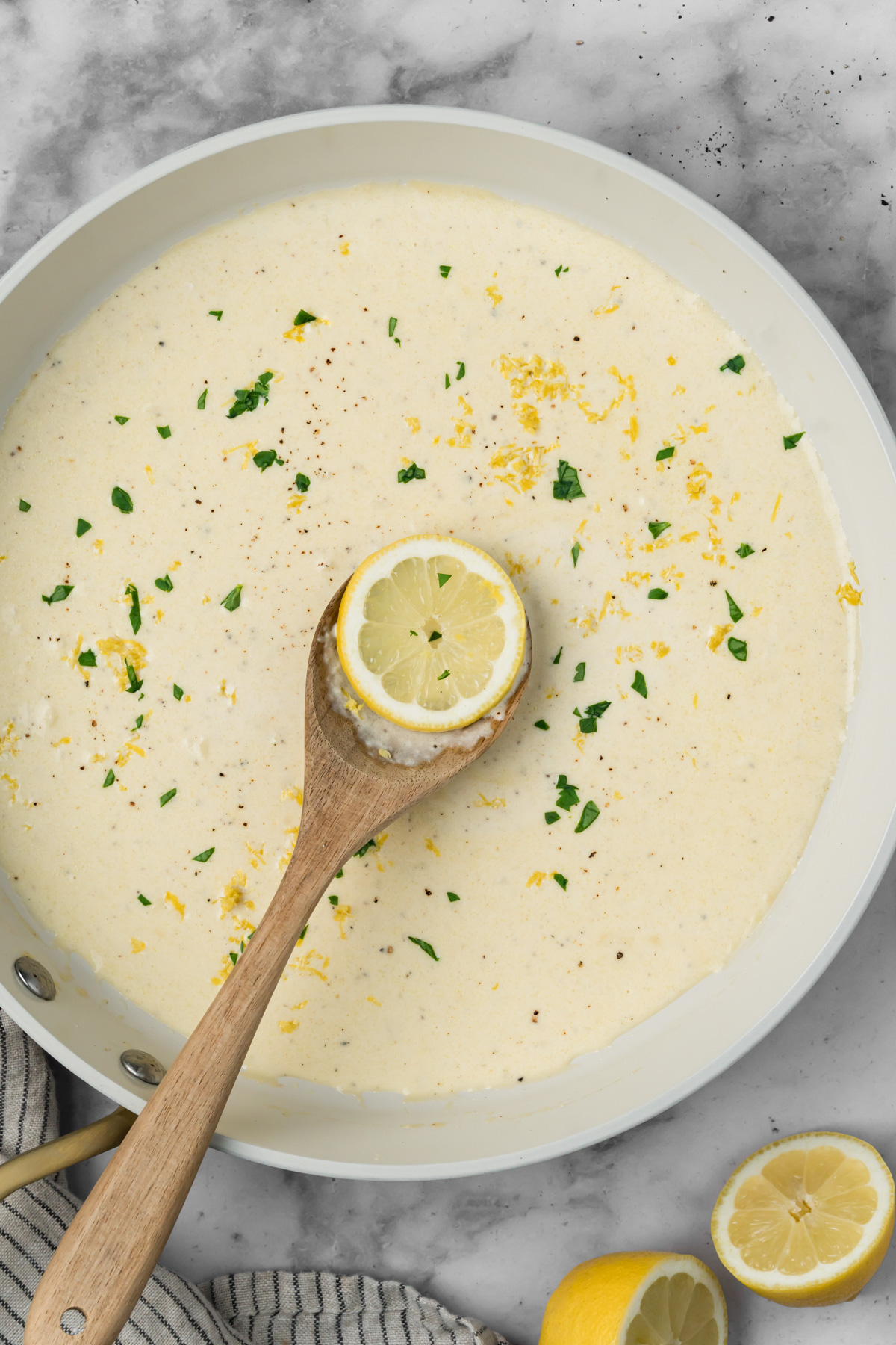 Lemon cream sauce in a skillet.