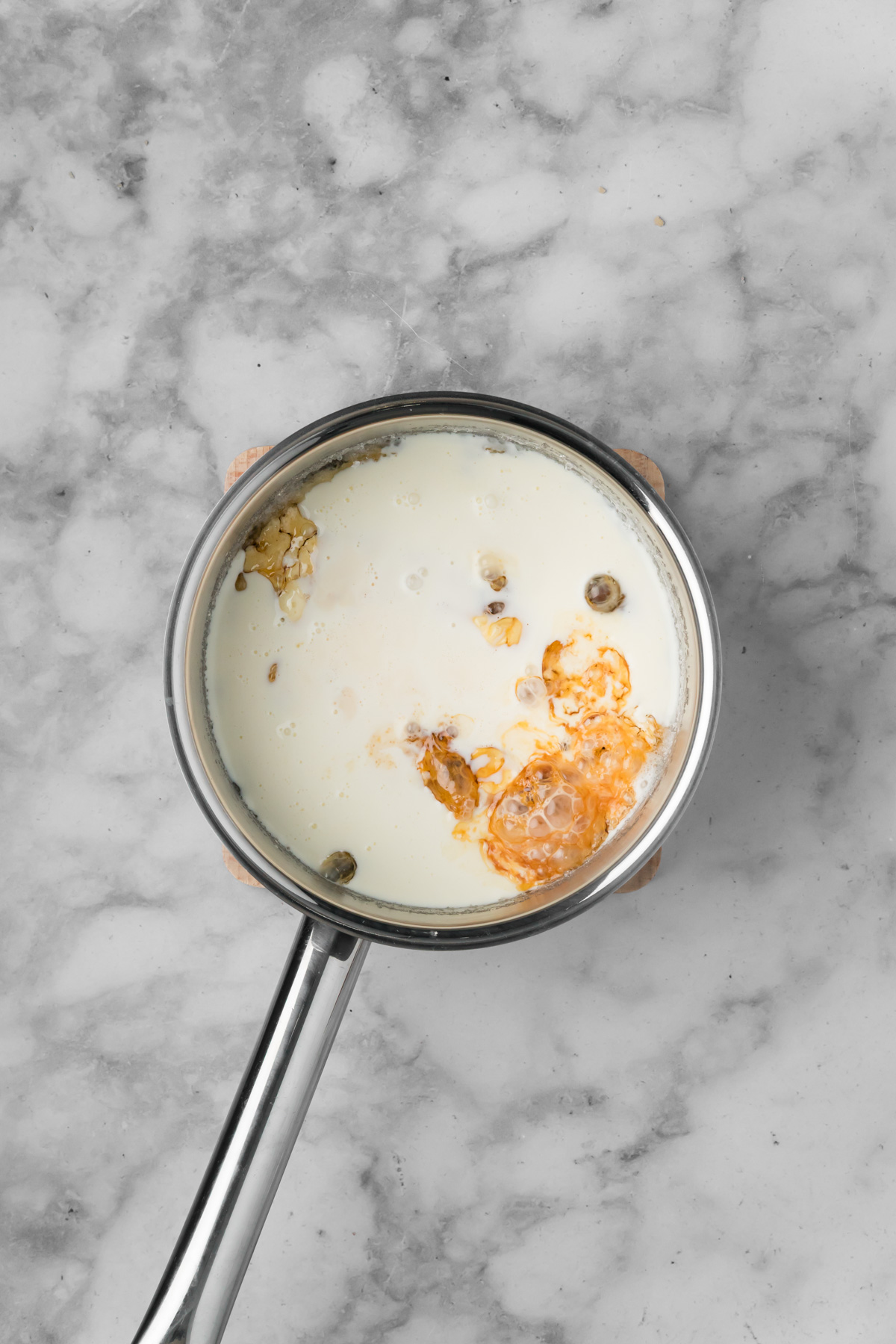 Heavy cream added into the caramel.