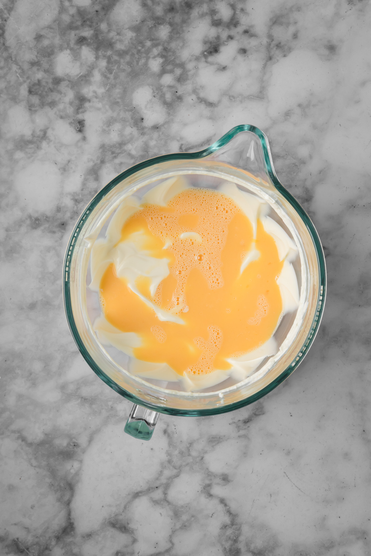 Eggs added into the cream cheese mixture.