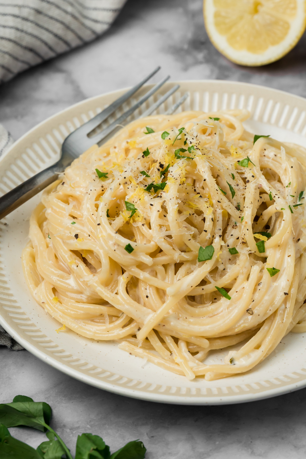 Plate of spaghetti with lemon cream sauce.
