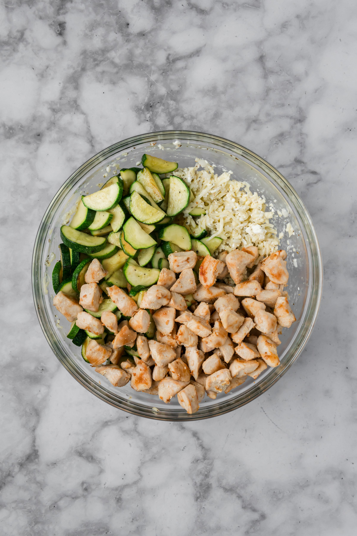 Zucchini, chicken, and a cheese mixture.