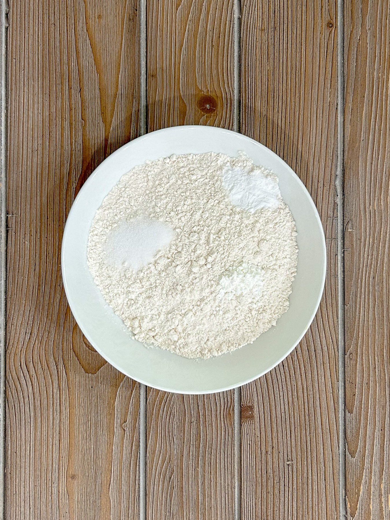 Dry ingredients in a white bowl.