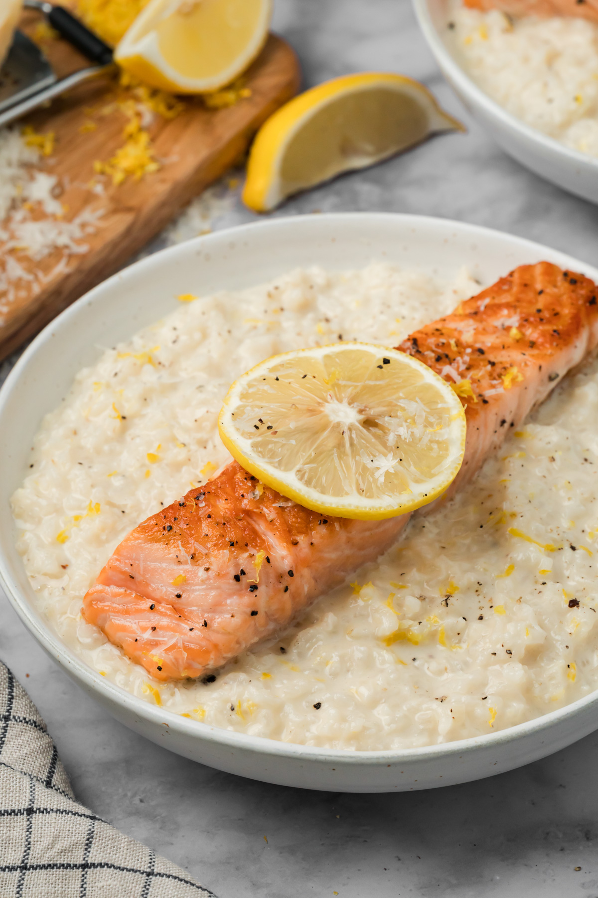 Salmon filet on top of the creamy risotto. 