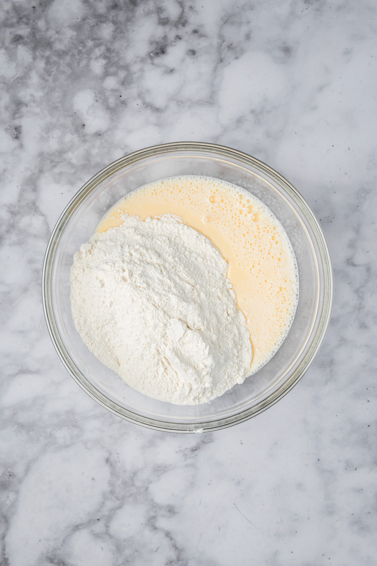 Dry ingredients added to the wet. 