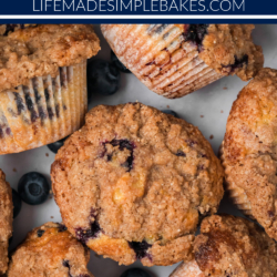 Skip the bakery line and enjoy these homemade Bakery Style Blueberry Muffins right at home! Fluffy muffins packed with juicy blueberries and topped with a sweet crumble.